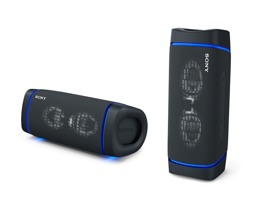 The Sony XB Extra Bass portable Bluetooth speaker shown standing straight up and down on the right, and another speaker of the same model laying on its side.