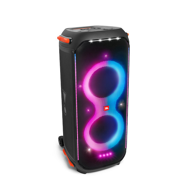 The JBL 710 party speaker standing upright. Its lights are set to blue and pink to create a cool visual effect.
