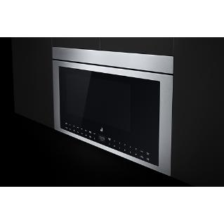 A built-in JennAir microwave with no handle, meant to be installed under a countertop.