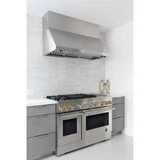 A RISE cooking range with a hood vent above it.