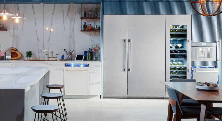 Thermador refrigeration units side-by-side with dishwashers and built-in coffee maker installed.