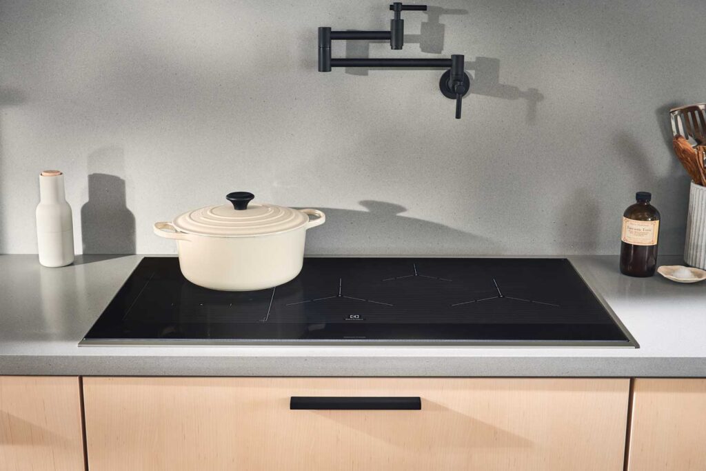 Electrolux Induction cooktop installed on a kitchen countertop.